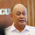 Kepala BGN Dadan Hindayana klarifikasi pengadaan 21.801 motor listrik untuk SPPG. Bukan 70.000 unit, produk lokal TKDN 48,5 persen, proses sesuai PMK 84/2025.